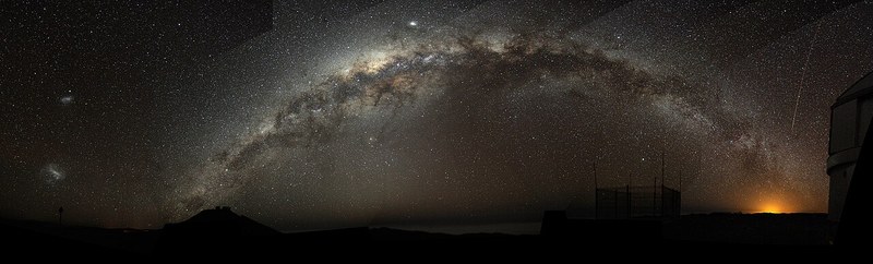 A faint band of stars arching across the night sky.